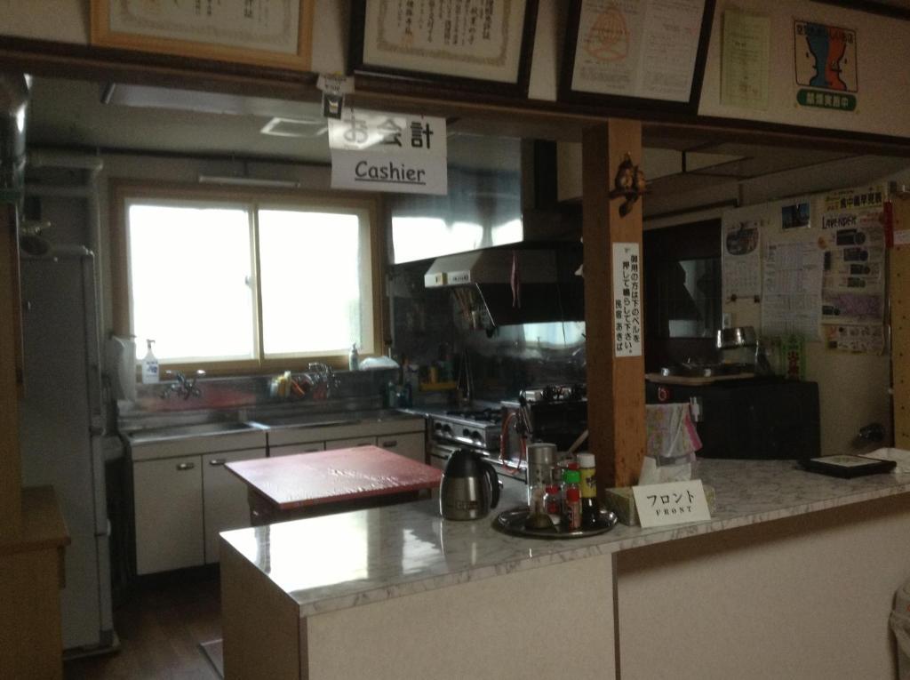 Minshuku Akiba Hotel Furano Bagian luar foto
